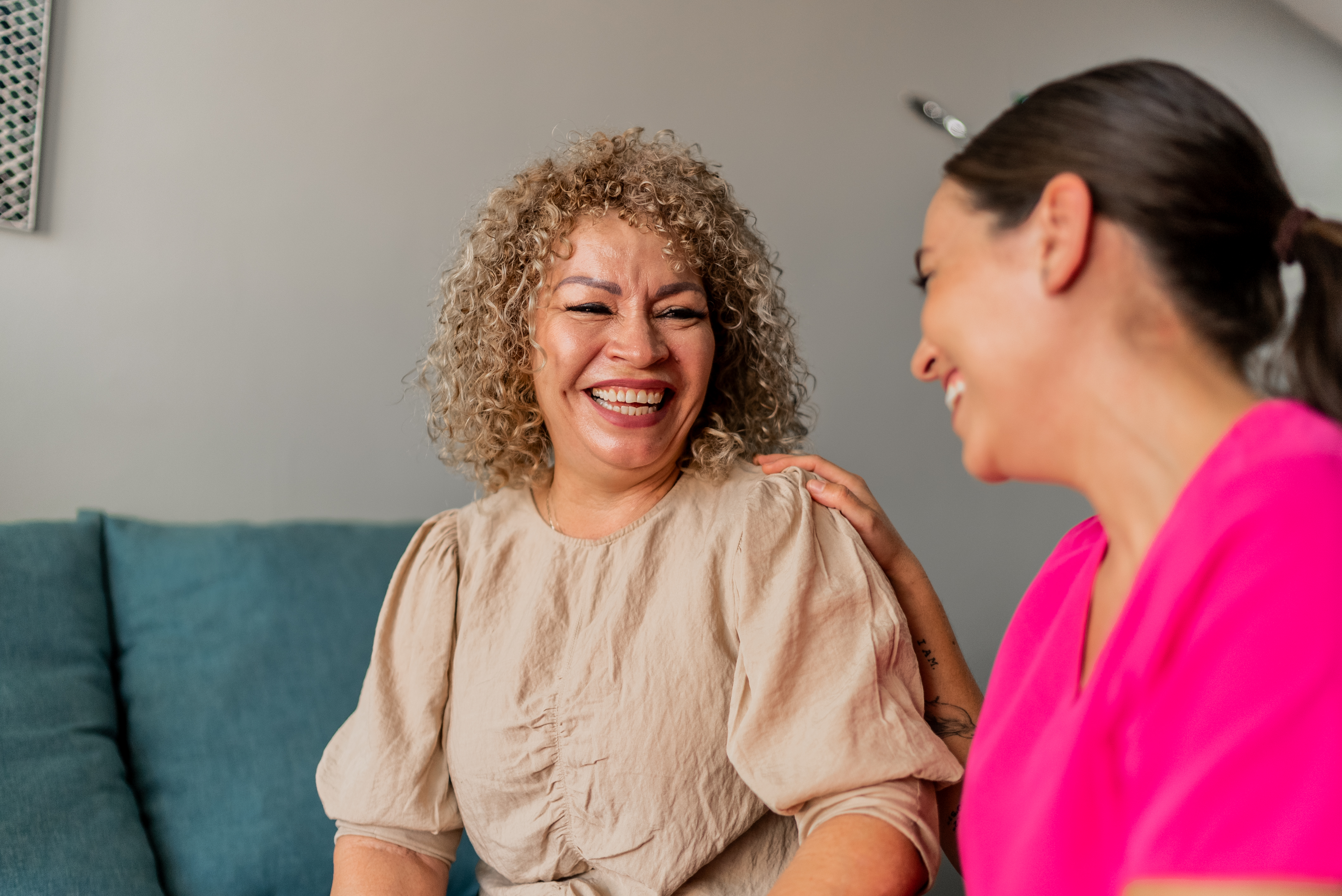 Two women sharing a smile