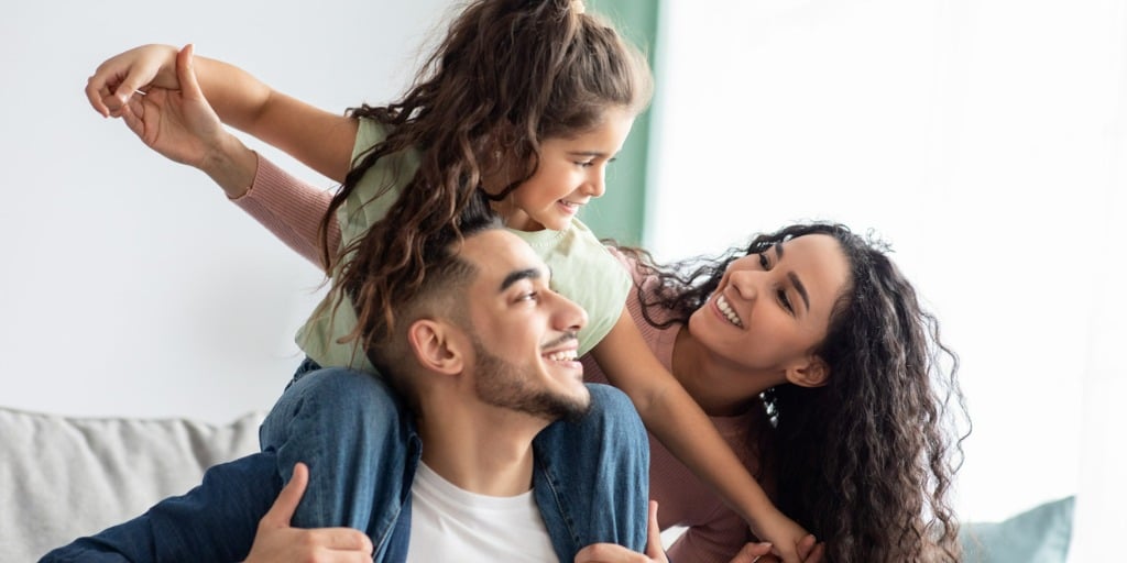 cheerful-middle-eastern-family-of-three-having-fun-together-at-home.jpg_s=1024x1024&w=is&k=20&c=CTCxe76fIRtnXmlwNuJTcAjm7f7kh0LSe1DLUvSDBJw=